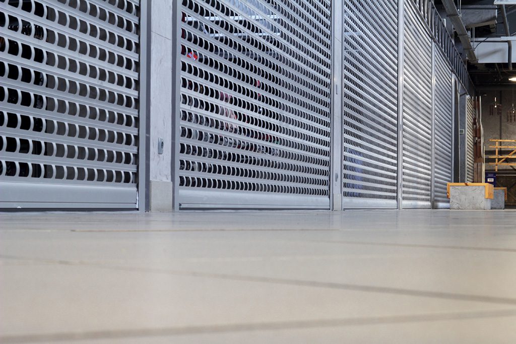 The,Floor,In,The,Mall,With,Closed,Metal,Grilles.